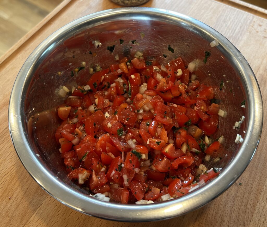 All the combined ingredients mixed to assemble the Bruschetta Steak